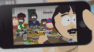 Selfie of white and black South Park characters at a dinner table with fried chicken